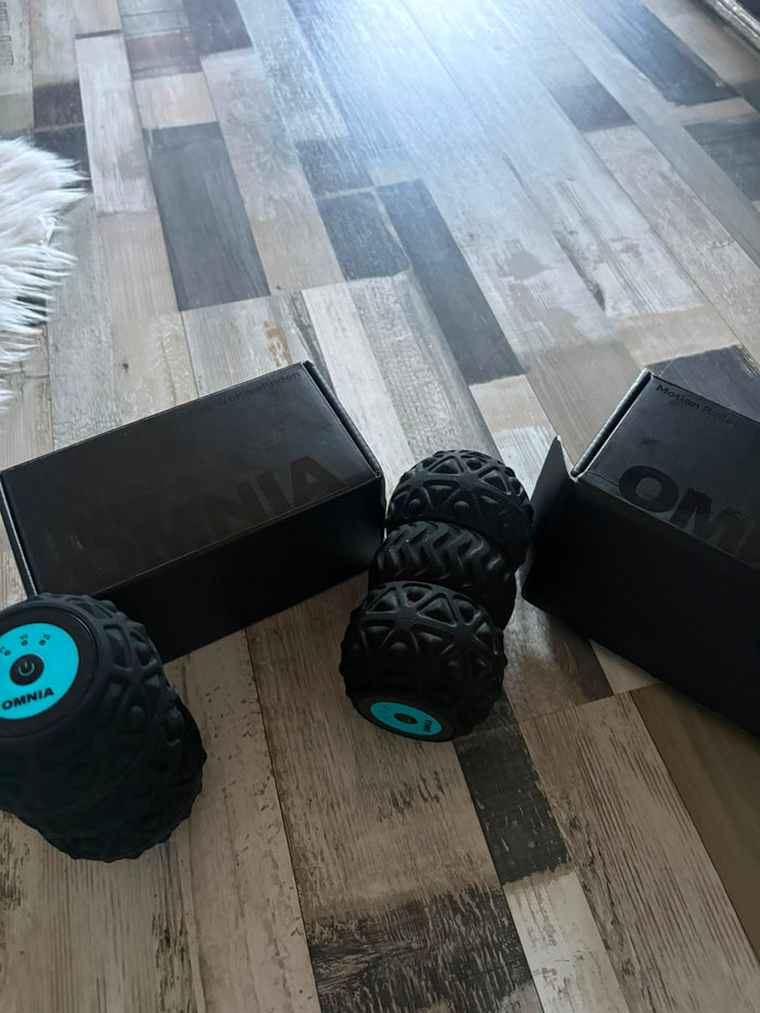 Zwei OMNIA Motion Roller mit Verpackung